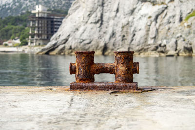 Old rusty pier over lake