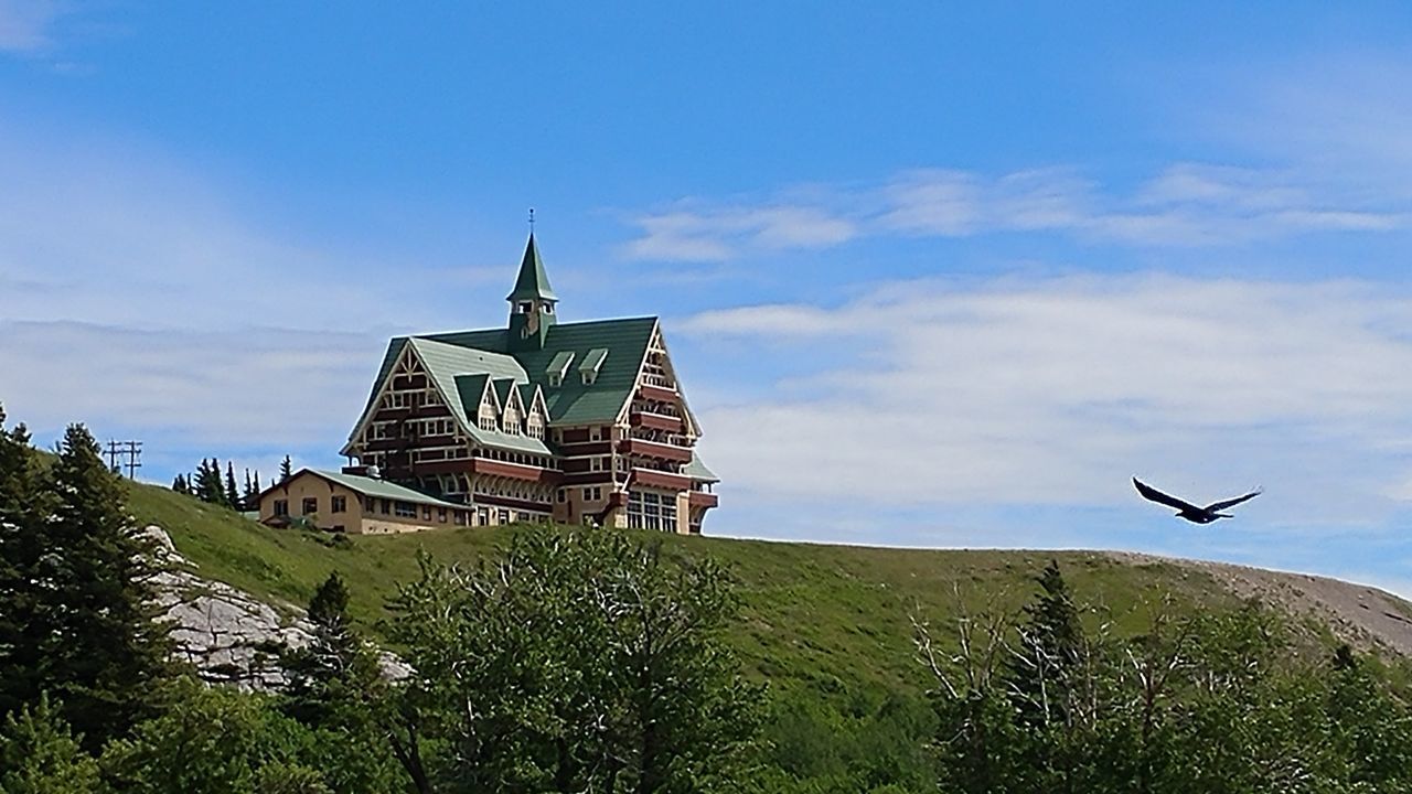 LOW ANGLE VIEW OF TRADITIONAL BUILDING AGAINST SKY