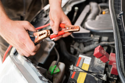 High angle view of man working on car