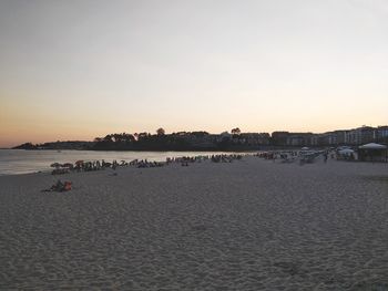 Scenic view of sea against clear sky during sunset