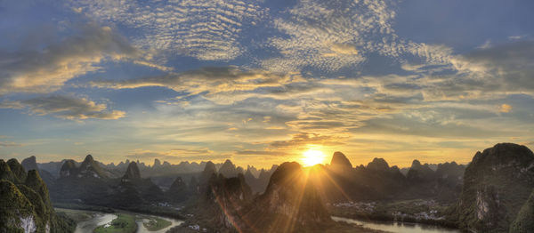 Panoramic view of forest against dramatic sky