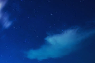 Low angle view of blue sky at night