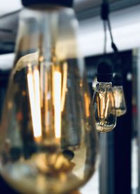 Close-up of illuminated light bulb