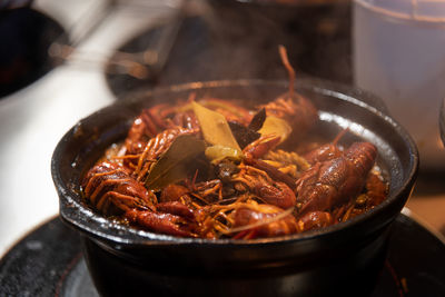 High angle view of meat in container on table