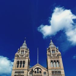 Low angle view of church against blue sky