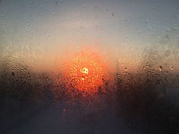Full frame shot of wet glass window during rainy season