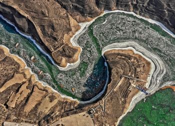 High angle view of rocks on road