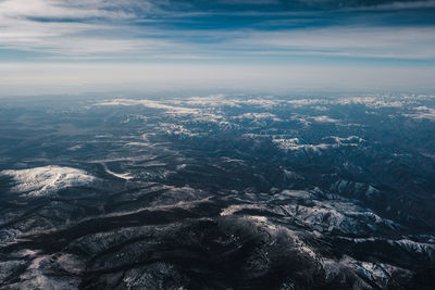 Aerial view of dramatic landscape against sky