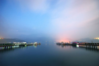 Scenic view of sea against sky at sunset