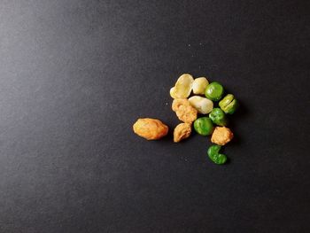 High angle view of vegetables on black background