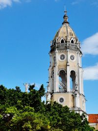 Low angle view of church against blue sky