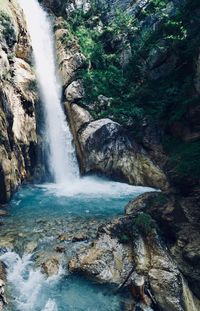 Scenic view of waterfall in forest