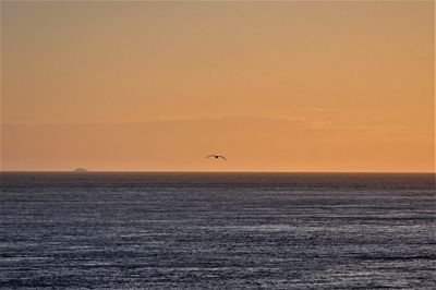 View of sea against sky during sunset