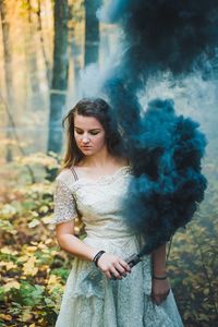 Beautiful young woman in a forest