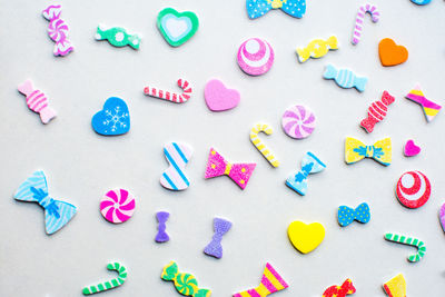 High angle view of multi colored candies on table