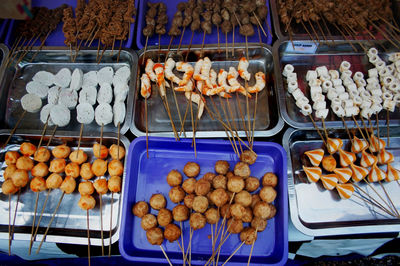 Sidoarjo-indonesia, may 2022. various forms of modern satay are sold at the city park of sidoarjo 