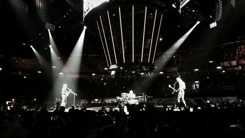 Group of people enjoying at concert