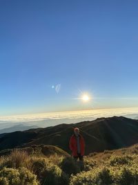 Scenic view of landscape against sky during sunrise