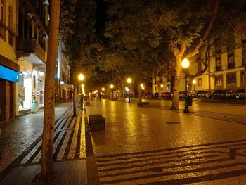 Illuminated street light at night