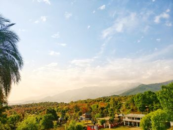 Scenic view of townscape against sky