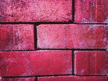 Full frame shot of red brick wall