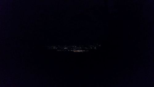 Close-up of water against sky at night