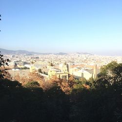 Cityscape against blue sky