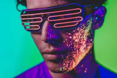 Close-up portrait of man wearing sunglasses