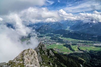 Aerial view of mountain range against sky