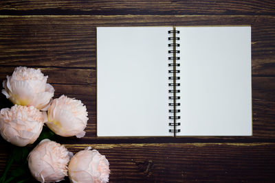 High angle view of open book on table