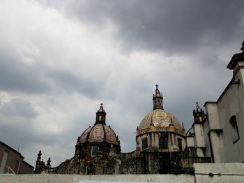 Low angle view of buildings against sky