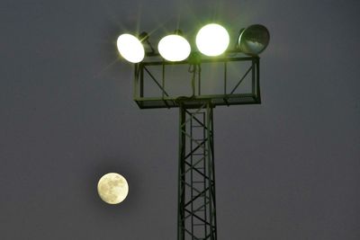 Low angle view of illuminated street light