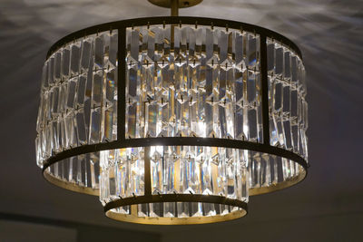 Low angle view of illuminated chandelier