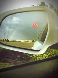 Reflection of sky on car window