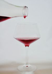 Close-up of red wine on table