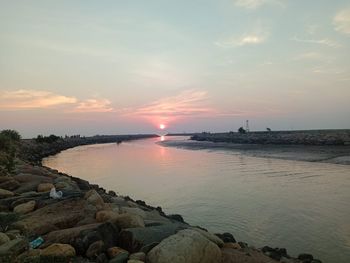 Scenic view of sea against sky during sunset