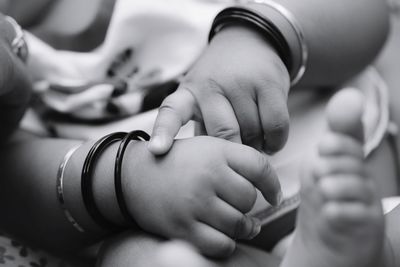 Close-up of woman holding hands