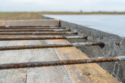 Close-up of rusty metal on field