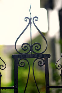 Close-up of closed metal gate