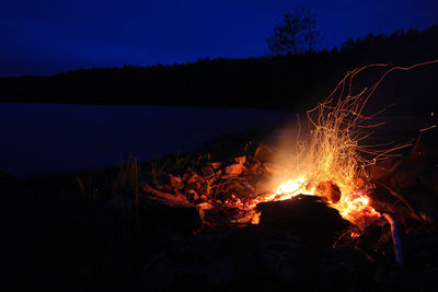 Bonfire against sky at night
