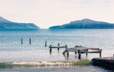 Abandoned wooden pier in gialova sea lagoon, peloponnese, greece