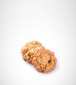 Close-up of cookies against white background