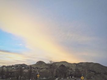 Scenic view of mountains against sky during sunset
