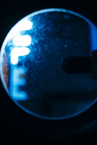 Close-up of illuminated light bulb