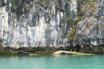 Scenic view of rock formation by sea