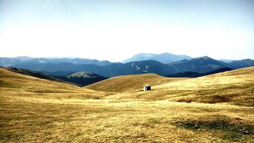 Scenic view of mountains against clear sky