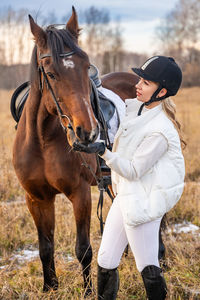 Horse standing on field