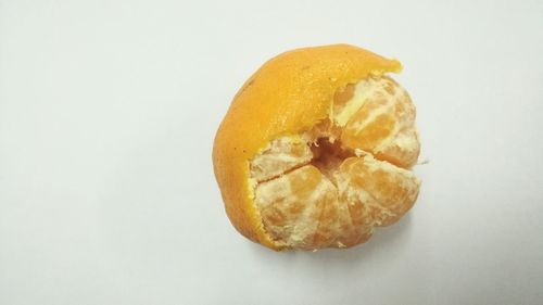 Close-up of fruit against white background