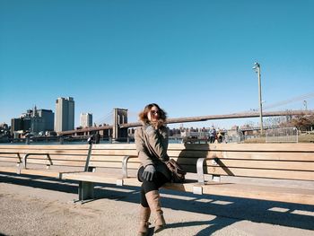 Portrait of woman standing in park