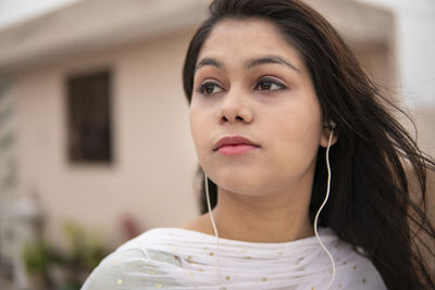 Close-up portrait of a young woman